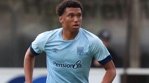 Defender Chanse Headman in action for Brentford's B team in a pre-season friendly