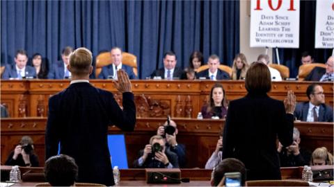 Holmes and Hill take the oath