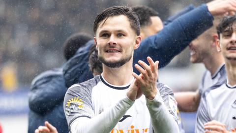 Liam Cullen celebrates Swansea's win over Cardiff in March