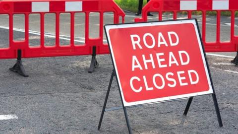 A road closure sign