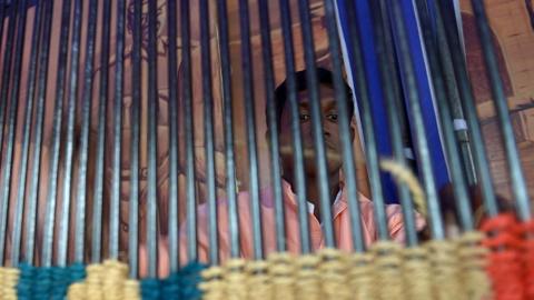 Newly-released Sri Lankan prisoners exit a prison complex during the country's 65th Independence Day in Colombo on February 4, 2013.