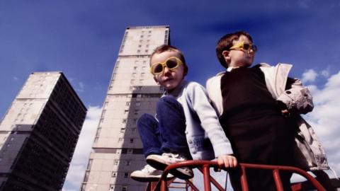Children playing near high rise flats