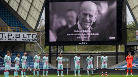 Swansea City observe a minute silence in honour of Prince Philip, Duke of Edinburgh, the day after the duke died at the age of 99