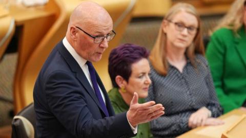 John Swinney speaks in the Scottish Parliament 