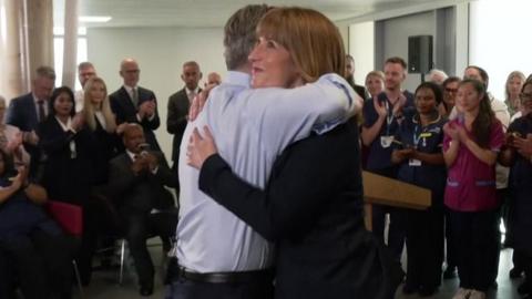Starmer and Reeves hug