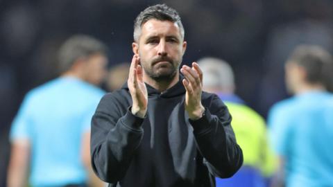 Alan Sheehan applauds Swansea's fans after defeat at Preston 