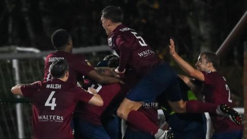 Adam Roscrow of Cardiff Met celebrates his winning goal against The New Saints