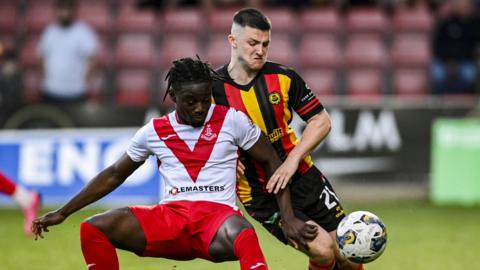 Airdrieonians' Kanayo Megwa and Partick Thistle's Aidan Fitzpatrick