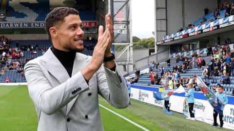 Rudy Gestede claps the Blackburn fans 