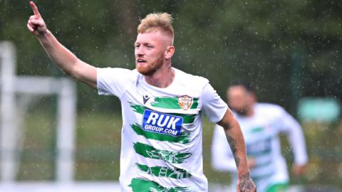 Brad Young celebrates after scoring an early goal for New Saints