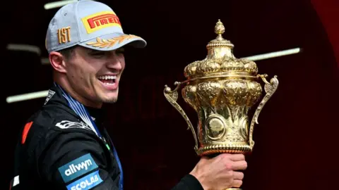 Start of the British Grand Prix in wet conditions, with Max Verstappen leading