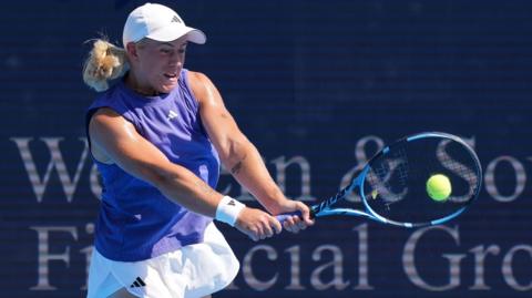 Britain's Sonay Kartal plays a shot