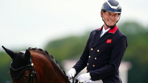 Carl Hester rides at the 2024 Olympic Games in Paris