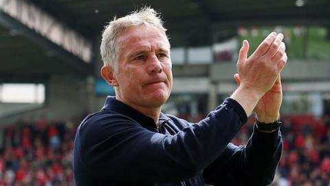 Wrexham manager Phil Parkinson applauds