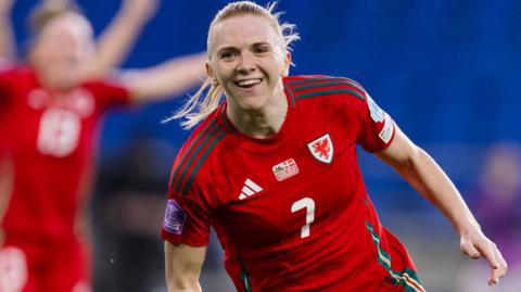 Ceri Holland celebrates