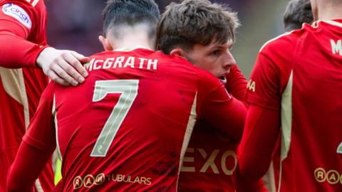 Aberdeen players celebrate