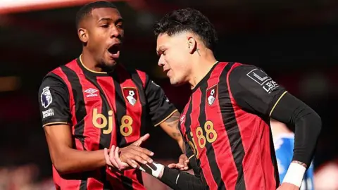 Evanilson and Rayan celebrate the Brazilian's equaliser against Sunderland