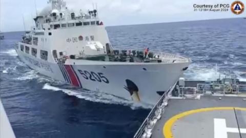 A Chinese coast guard vessel makes contact with a Philippines ship