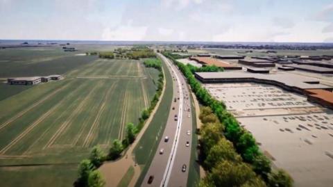 Digital aerial image of a dual carriageway with fields on the left hand side and a car park on the right