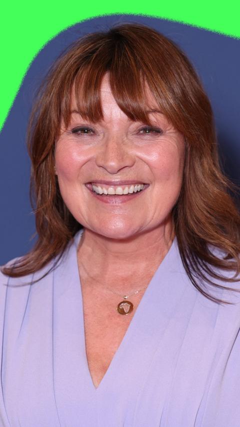 Lorraine Kelly wearing a purple dress