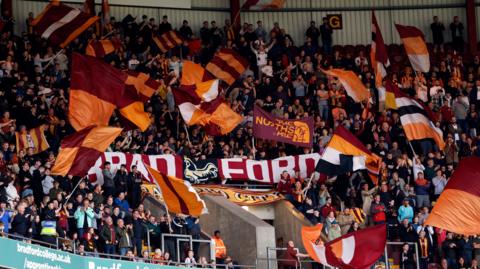 Bradford City fans in the stands show their support ahead of the Sky Bet League Two play-off semi-final first leg match at the University of Bradford Stadium, Bradford