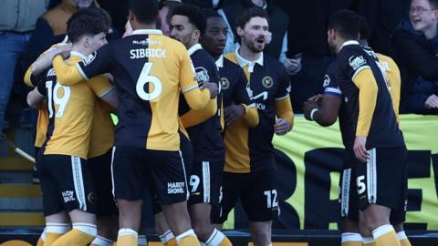 Burton players celebrate