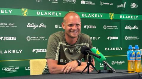 Norwich head coach Liam Manning at press conference