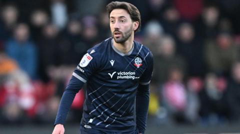Josh Sheehan in action for Bolton Wanderers