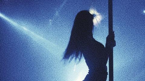 Silhouette of pole dancer