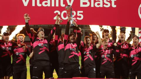 Somerset captain Lewis Gregory lifts the T20 Blast trophy