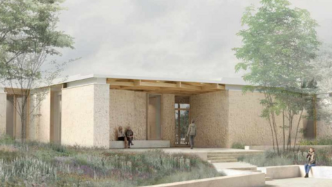 An artists drawing of a single story building wth a flat wooden roof with steps leading to an entrance area and seating area. A person is seen walking towards the entrance whilst to figures are sat over looking a landscaped garden area.