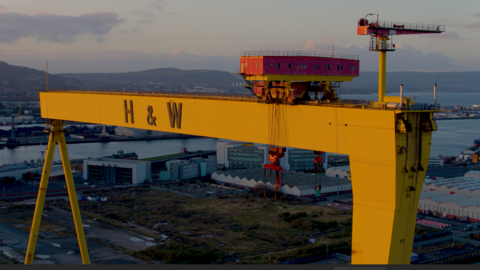 The yellow Harland and Wolff crane with Belfast Harbour in the background. 