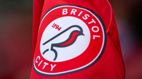 Bristol City badge on a flag
