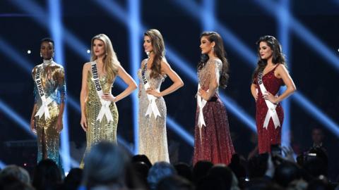 The top five Miss Universe contestants - including Zozibini Tunzi - on stage