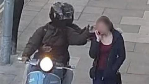 Moped riders steal woman's phone