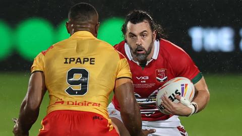 Wales' Rhys Williams on the charge for Wales against Papua New Guinea at the World Cup