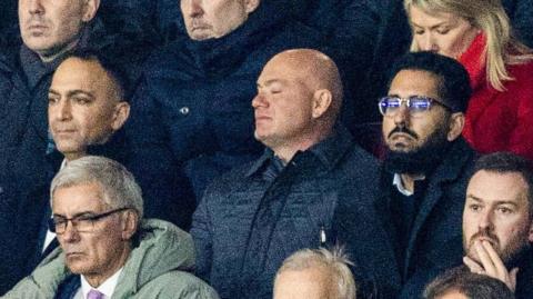 Paraag Marathe and Gene Schneur in the Rangers stand