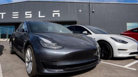 Tesla cars outside a dealership