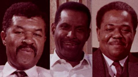 Windrush arrivals Sam King, Euton Christian and Flight Lieutenant Vidal Dezonie being interviewed by the BBC