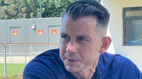 Luton Town manager Matt Bloomfield answering reporter questions 