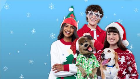 Blue Peter presenters in Christmas outfits.