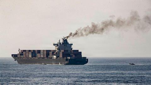 In this handout photo provided by U.S. Central Command, U.S. forces patrol the Arabian Sea near M/V Touska on April 20, 2026, after firing upon the Iranian-flagged vessel that the U.S. accused of attempting to violate the U.S. naval blockade of Iranian ports near the Strait of Hormuz. 