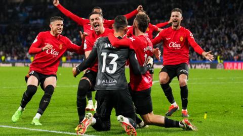 Mallorca players celebrate after their penalty shootout win over Real Sociedad