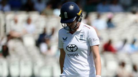 Lauren Bell looks dejected after being bowled