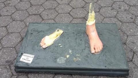 In pictures: Nude Donald Trump statues amuse crowds - BBC News