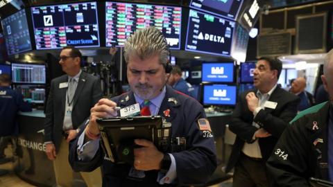 Traders at the New York Stock Exchange