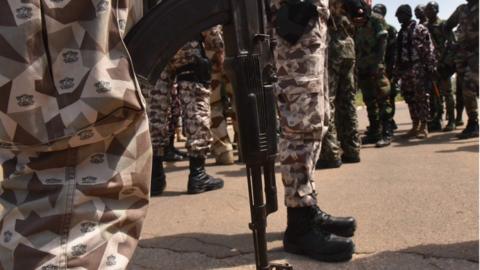 Ivory Coast soldiers standing guard at the airport in Bouake