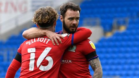 Blackburn's Adam Armstrong is congratulated