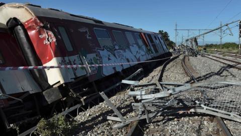 A Greek express train slammed into a house after derailing near the northern city of Thessaloniki, killing three people and seriously injuring three others, 14 May 2017