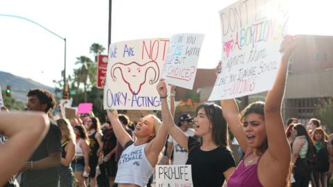 Abortion rights protesters chant during a Pro Choice rally at the Tucson Federal Courthouse in Tucson, Arizona on Monday, July 4, 2022